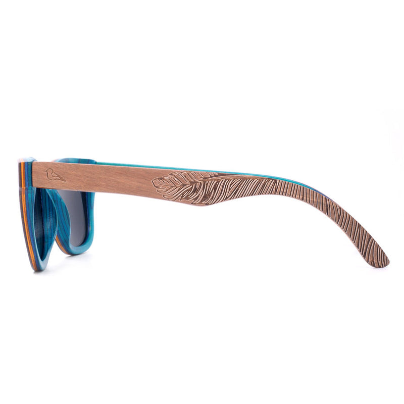 Side detail view of eco-friendly wooden sunglasses with blue wood inside