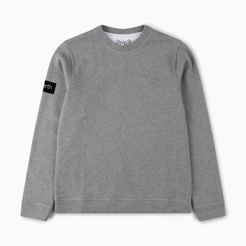 ONE Earth logo embroidered patch sewn onto grey marl organic cotton sweatshirt on right bicep as worn