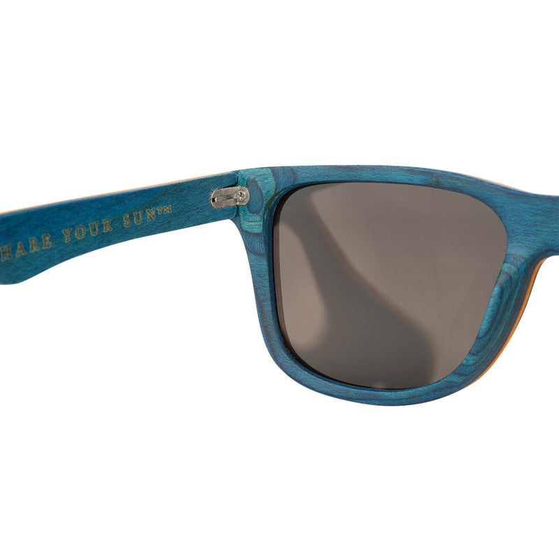 Close up inside view of eco-friendly wooden sunglasses with blue wood inside